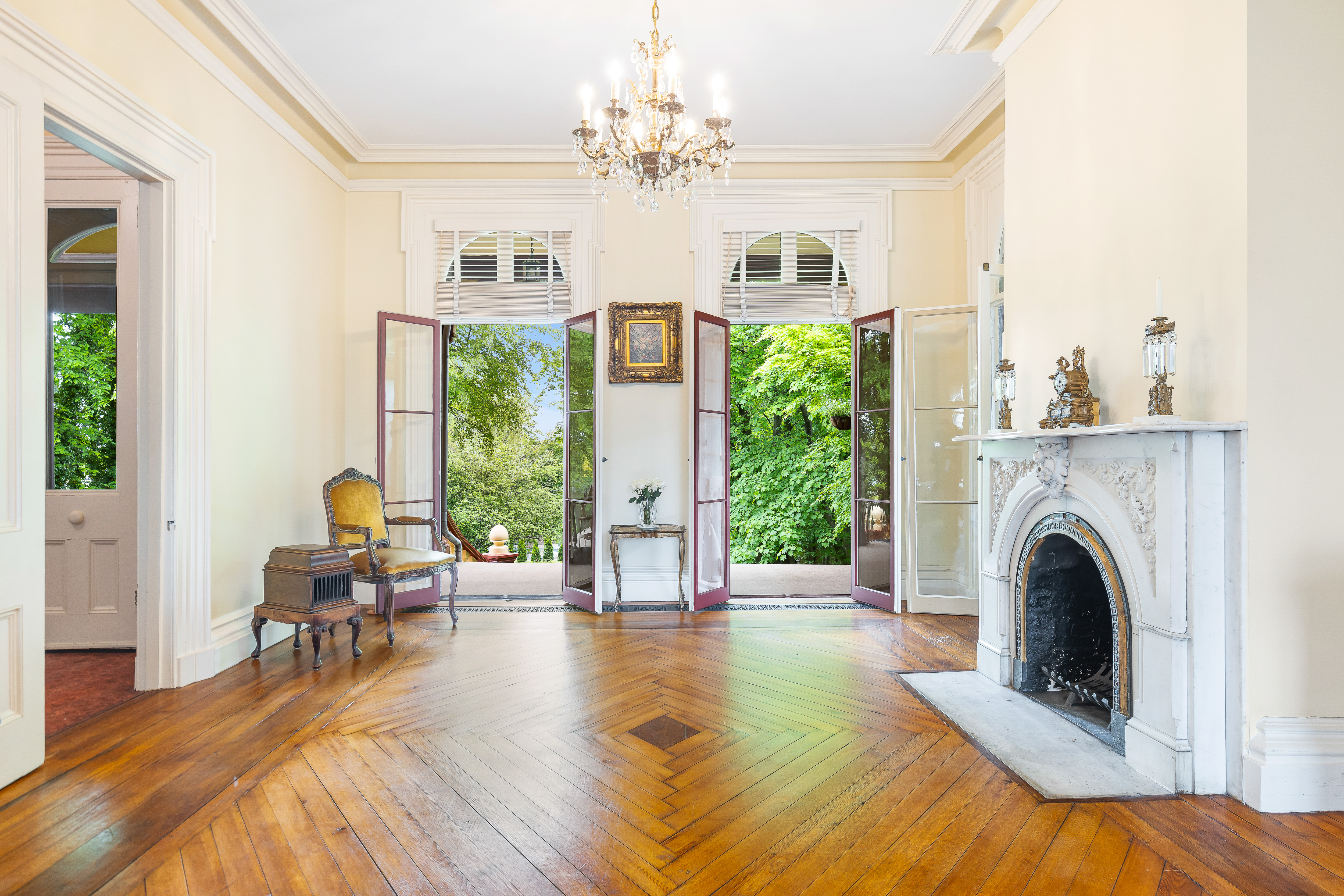 Parlor with French doors open to porch