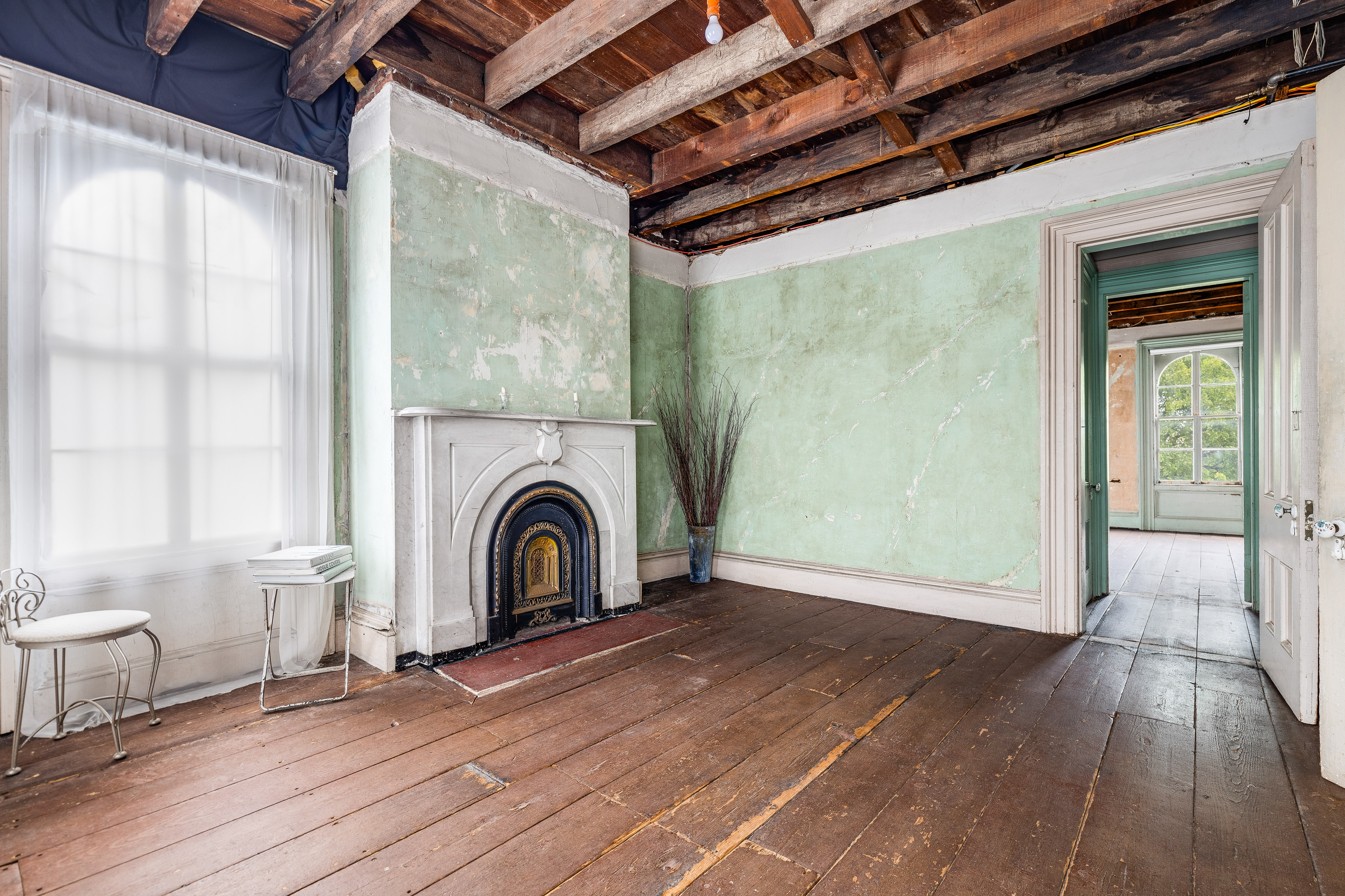 Upper floor room with fireplace